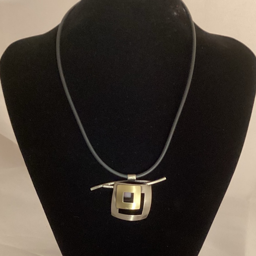 Christophe Poly gold tone and silver tone necklace